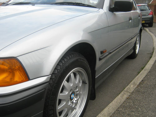 1995 BMW 318i Left Side