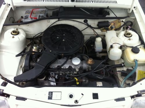 1987 vauxhall nova club white engine bay